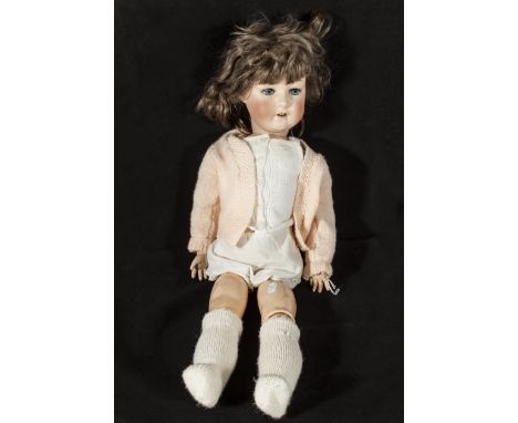 A bisque head doll