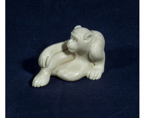 A netsuke modelled as a monkey