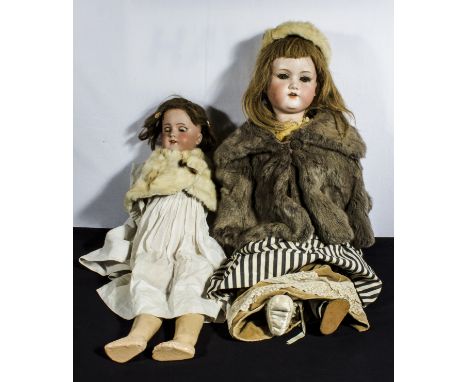 Two bisque head dolls