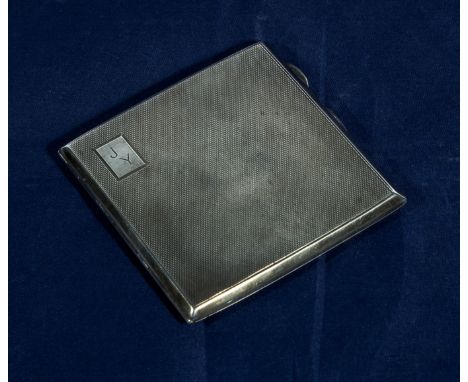 A silver cigarette case date marks for Birmingham 1935, initialled J Y. Weight 106gms