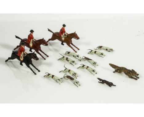 A near complete set of Britains lead fox hunting figures, three huntsmen on horseback two foxes and nine hounds