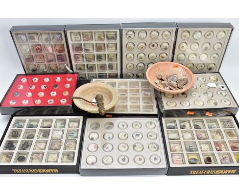 A LARGE COLLECTION OF 'TREASURES OF THE EARTH' semi precious gemstones, eleven case in total, gemstones including various qua