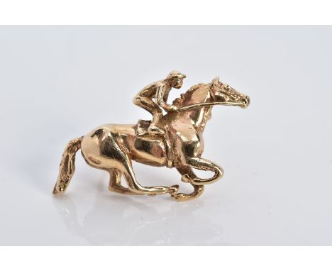 A 9CT GOLD JOCKEY BROOCH, hallmarked 9ct gold London 1989, makers mark H G, length 34.9mm, approximate gross weight 10.2 gram