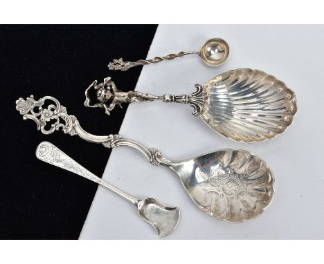 FOUR CONTINENTAL SILVER/WHITE METAL CONDIMENT ITEMS, comprising a caddy spoon with a cherub handle and shell shaped bowl,a No