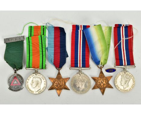 A GROUP OF WWII MEDALS to include 1930-45 Atlantic Stars, Defence and two War medals (un-named as issued) together with a R.O