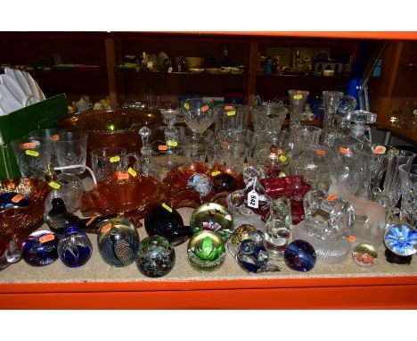 A GROUP OF GLASSWARE, including modern paperweights, orange carnival glass bowls, Stuart Crystal atomiser and tankard, Langha