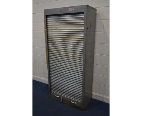 AN INDUSTRIAL METAL TAMBOUR FRONT STORAGE UNIT, with later pine shelves, width 90cm and depth 47cm x height 193cm (sd, but ro