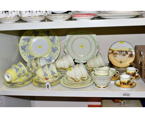 A WEDGWOOD BONE CHINA PALE YELLOW AND GREY IVY LEAF PART TEA SET, pattern No W3927, comprising six cups, six saucers, six tea