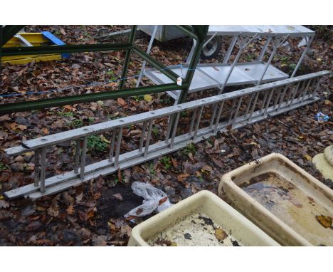 AN ALUMINIUM DOUBLE EXTENSION LADDER