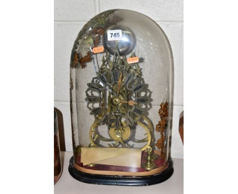 A VICTORIAN BRASS SKELETON CLOCK OF GOTHIC DESIGN, single fusee movement, anchor escapement, bell with axe head striker, fret