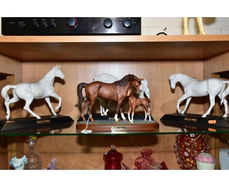 THREE BESWICK WHITE MATT GLAZE HORSE FIGURES, AND A ROYAL DOULTON HORSE AND FOAL ON PLINTH FIGURE, comprising Royal Doulton '