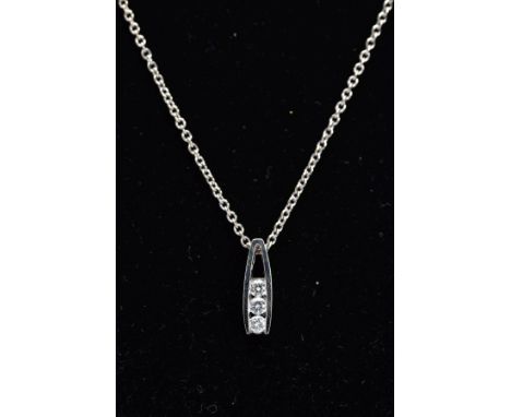 AN 18CT WHITE GOLD DIAMOND PENDANT NECKLACE, the pendant of an openwork drop design, set with three round brilliant cut diamo