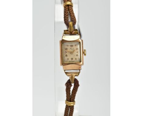 A 9CT GOLD LADYS HAND WOULD 'AVIA' COCKTAIL WRISTWATCH, the rectangular case with a square cream dial, Arabic and spot marker