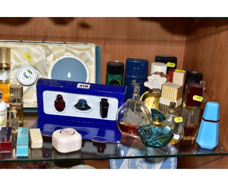 A COLLECTION OF PERFUME BOTTLES, BEAUTY PRODUCTS etc, mostly empty or nearly empty, to include 'Lumiere', 'Casbah', 'Vanderbi