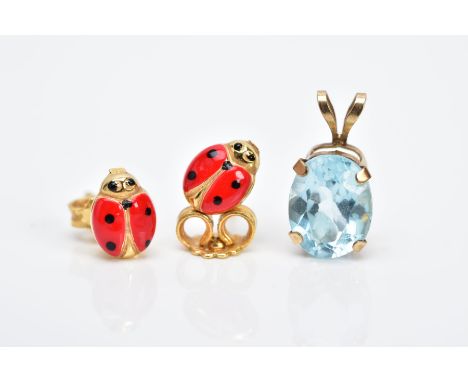 A PAIR OF YELLOW METAL EARRINGS AND A PENDANT, each earring in the form of a ladybird with red and black enamel, post and scr