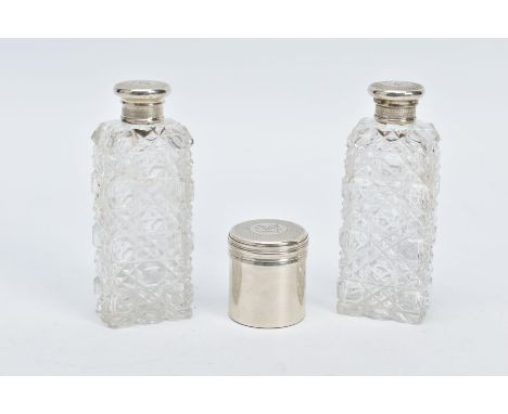 TWO MID-VICTORIAN CUT GLASS SCENT BOTTLES AND PILL BOX, the two cut glass scents, each fitted with engine turn and lion engra