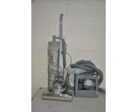 A KIRBY G SERIES 'THE ULTIMATE' VACUUM CLEANER with attachments in a caddy