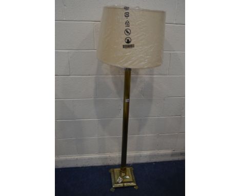 A MODERN BRASS CORINTHIUM COLUMN STANDARD LAMP, with a fabric shade