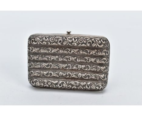 A WHITE METAL ORNATE CASE, of a floral and foliate embossed design, fitted with a push button clasp, opens to reveal two comp