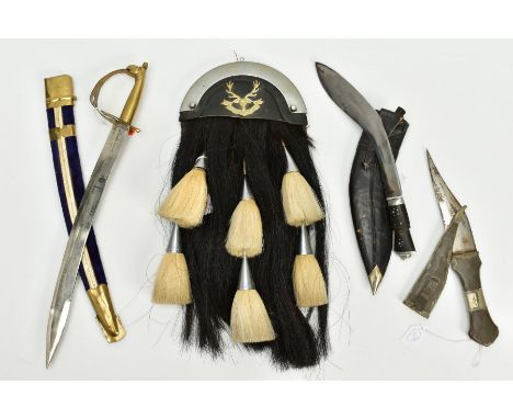 THREE CRUEDLY MADE TOURIST STYLE CURVED BLADE DAGGER/KNIVES, possibly Asian, one is marked made in India, all have scabbard, 