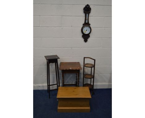 AN OAK THREE TIER FOLDING CAKE STAND, together with an oak barley twist occasional table, torchere stand, oak aneroid baromet