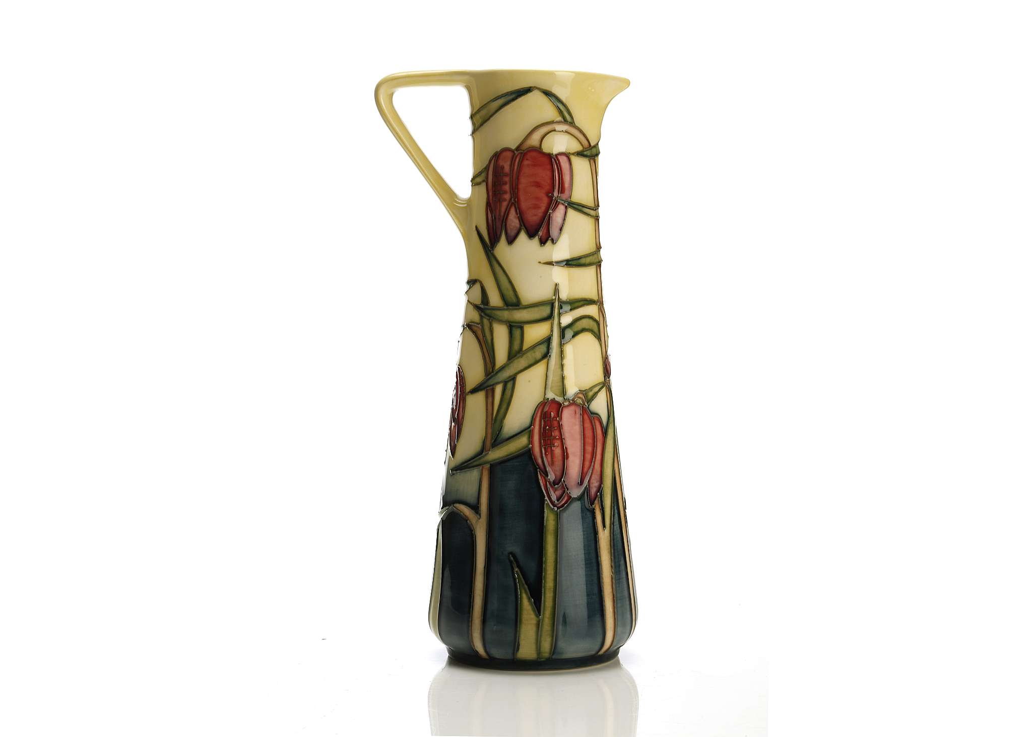 A MOORCROFT POTTERY JUG BY PHILIP GIBSON, dated 2001, of tapered