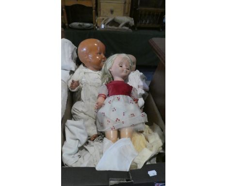 A Collection of Three Vintage Dolls and Dolls Clothes 
