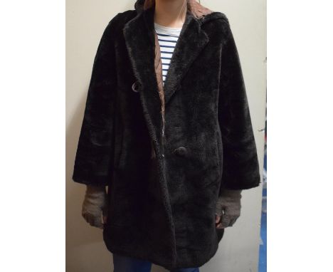 A Vintage Faux Fur Jacket and Hood 