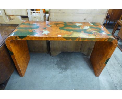An oriental copper chinoiserie lacquered console table 