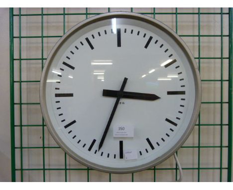 A vintage G.P.O. circular wall hanging clock 
