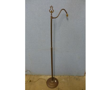 A copper floor standing lamp 