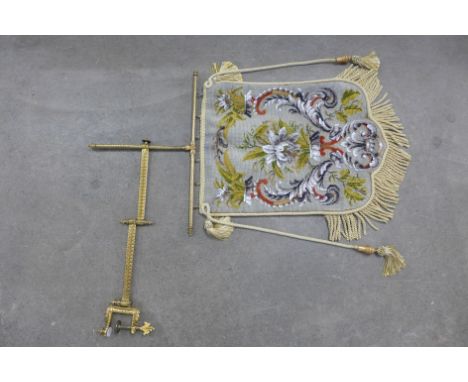 A Victorian adjustable gilt metal and tapestry fire screen 
