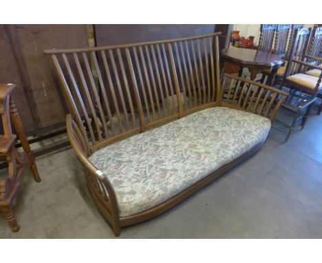 An Ercol Golden Dawn elm and beech Renaissance settee 