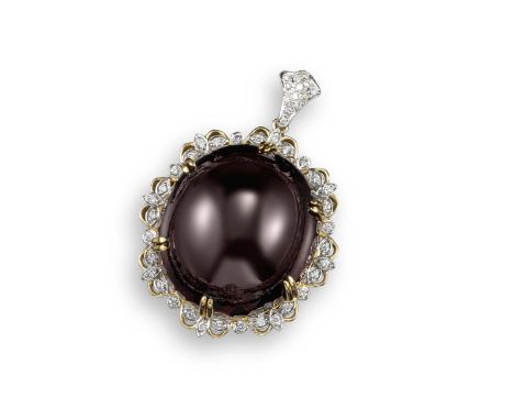 A garnet and diamond pendant, the large garnet cabochon weighs approximately 98cts, set within a surround of circular-cut dia