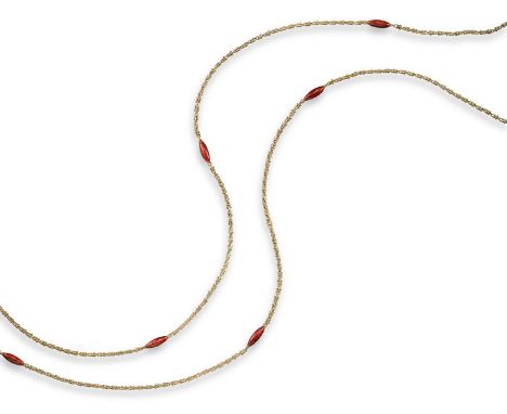 A French gold and enamel long guard chain, the fancy links set with ten red enamel lozenges, French control mark, 146cm long,