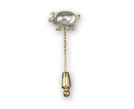 A novelty stick pin in the form of a pig, the body formed from a mabé pearl, set with diamonds and a ruby eye, in platinum an