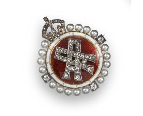 Of Royal Interest: An Edwardian small circular brooch with the Royal cipher of Queen Alexandra, the cipher applied to the red