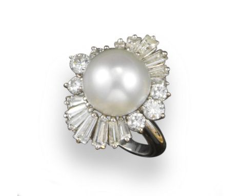 A cultured pearl and diamond ring, the white cultured pearl is set within undulating border of tapered baguette-shaped diamon