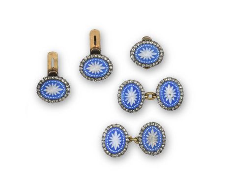 A pair of diamond and Jasperware cufflinks by Cartier, the oval links are set with a blue and white Jasperware section, of fo