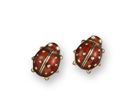 A pair of ladybird earrings, realistically formed and set with gold pellets to the red enamel, diamond eyes, mounted in yello