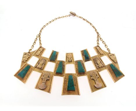 An abstract gold necklace, of chequerboard design, the textured tapered rectangular sections are alternately-set with green h