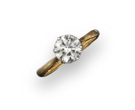 A diamond solitaire ring, the round brilliant-cut diamond weighs approximately 1.00cts and is set in platinum and yellow gold