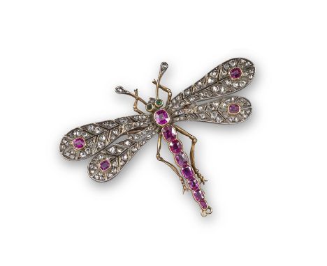 A late Victorian ruby and diamond dragonfly brooch, the abdomen and thorax set with graduated cushion-shaped rubies, with eme