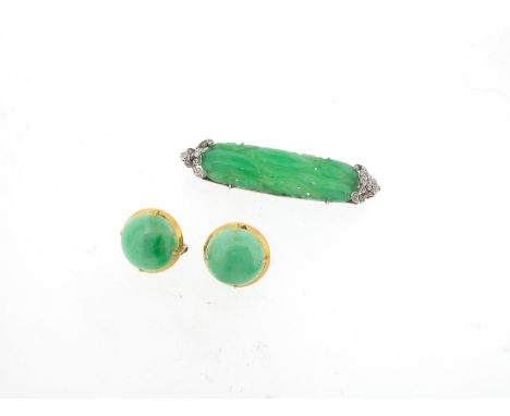 A collection of jade-mounted jewellery, including a jade and diamond brooch, the pierced and carved jade section with diamond