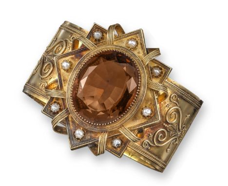 A mid 19th century citrine-set gold bangle, the large oval-shaped citrine set within yellow gold ropetwist surround, rectangu