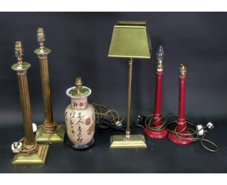 A contemporary Coach House gilt metal table lamp and shade, 60cm high, a pair of gilt metal columnar table lamps, 56cm high a