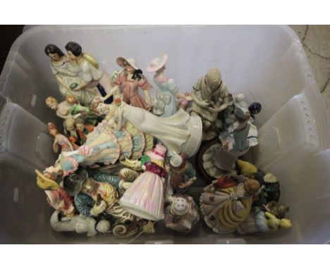 A large collection of ceramic and resin figures 