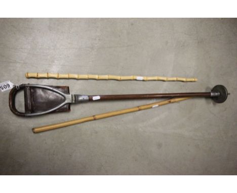 A shooting stick, along with two bamboo swagger sticks 