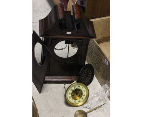 A mahogany cased mantel clock