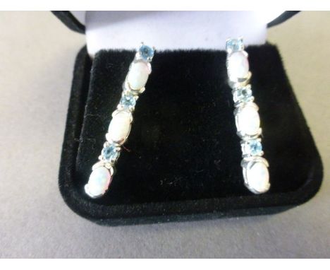 A pair of silver CZ and opal drop earrings 